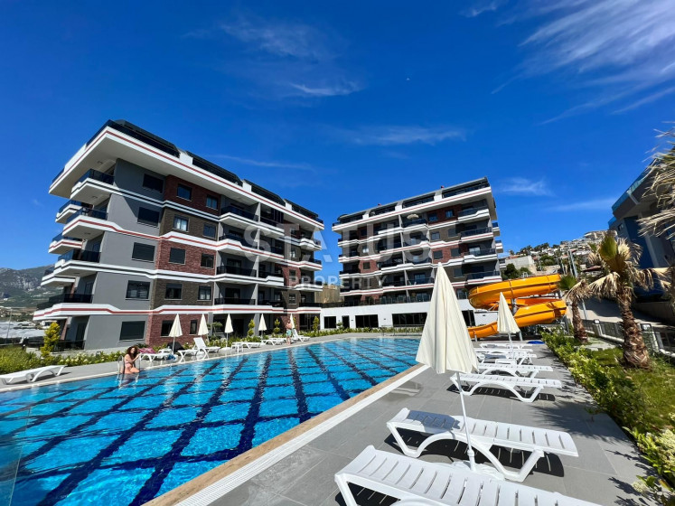 Меблированные апартаменты 1+1 в районе Каргыджак, 55 м2 фото 1