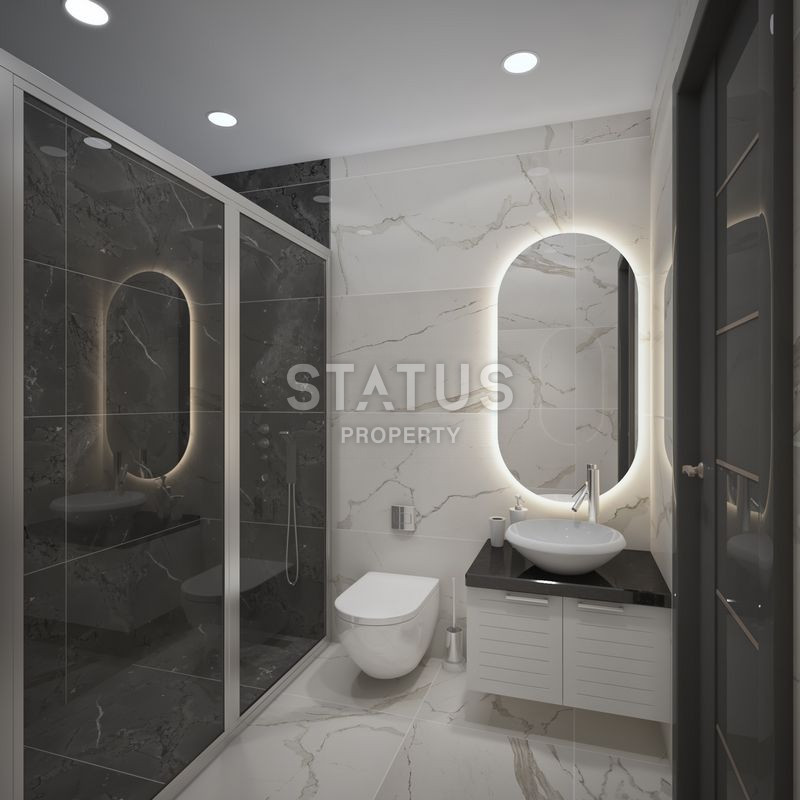 Последние квартиры в резиденции премиум класса в центре Махмутлара 100м от моря. фото 6