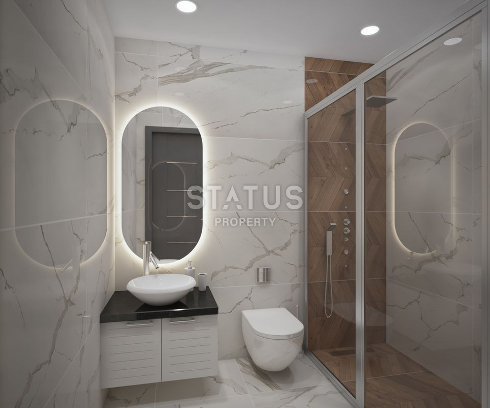 Последние квартиры в резиденции премиум класса в центре Махмутлара 100м от моря. фото 12