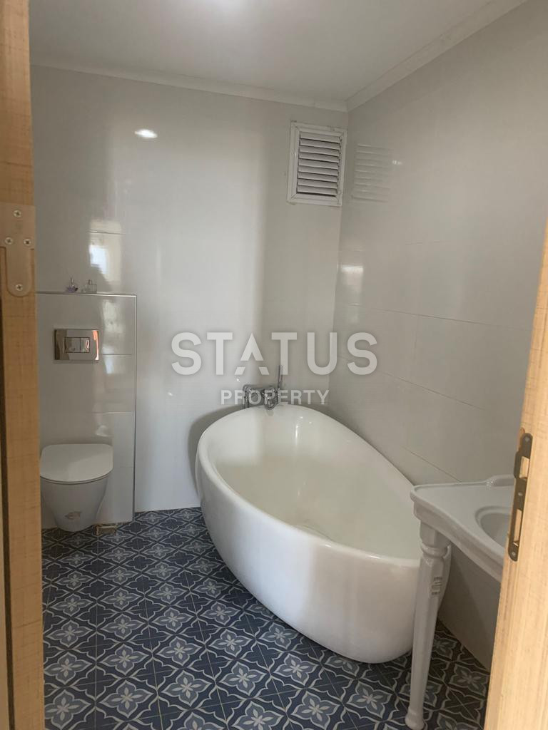 Просторный дуплекс 4+1 с видом на море и Кале от ведущего застройщика в Джикджилли. 280м2 фото 11