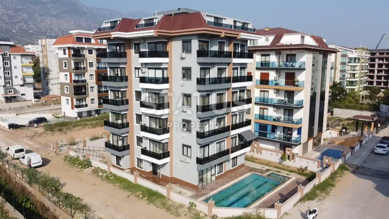 Мебелированная квартира в новом ЖК в 100м от моря в Кестеле. 50м2 фото 1