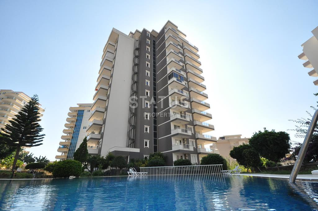 Трехкомнатная квартира в районе Махмутлар 115 м2 фото 1