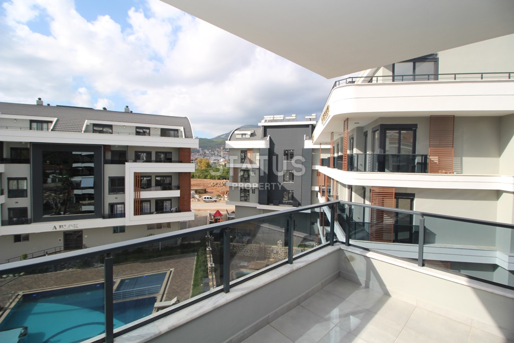 Двухкомнатная квартира в районе Оба. 55м2. фото 12