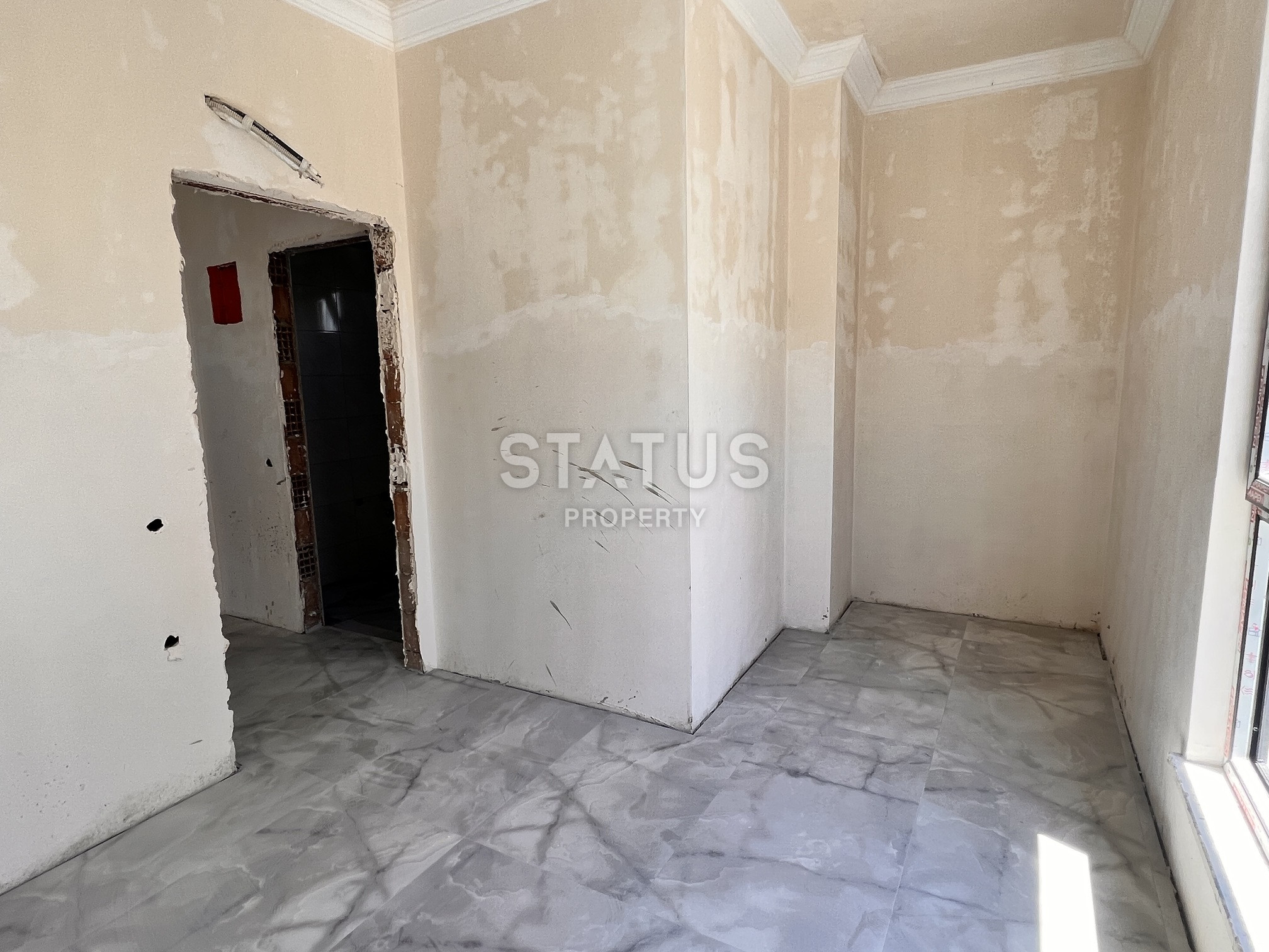 Двухкомнатная квартира на этапе пред сдаче в 400м от моря в Махмутларе. 60м2 фото 6