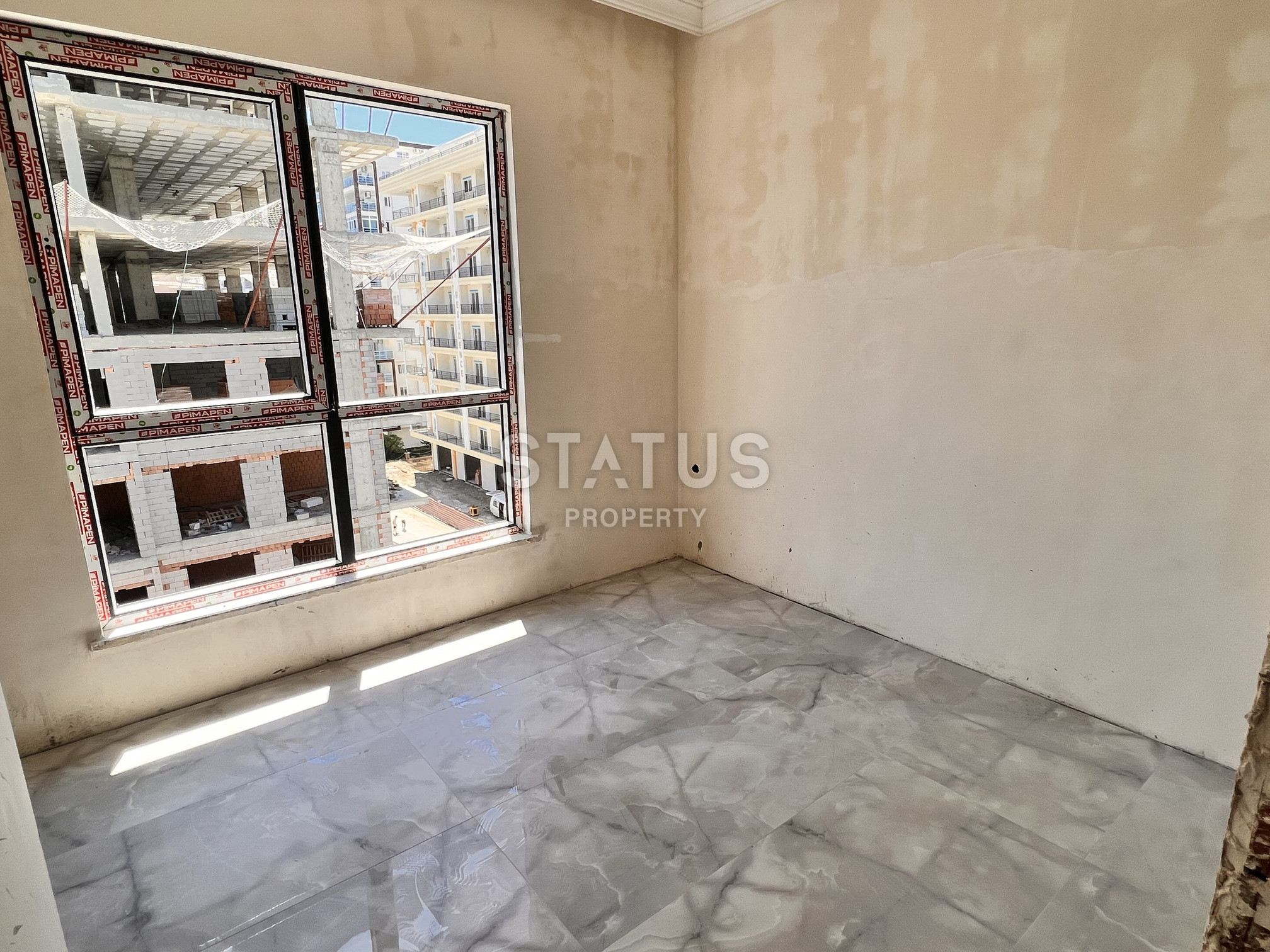 Двухкомнатная квартира на этапе пред сдаче в 400м от моря в Махмутларе. 60м2 фото 7