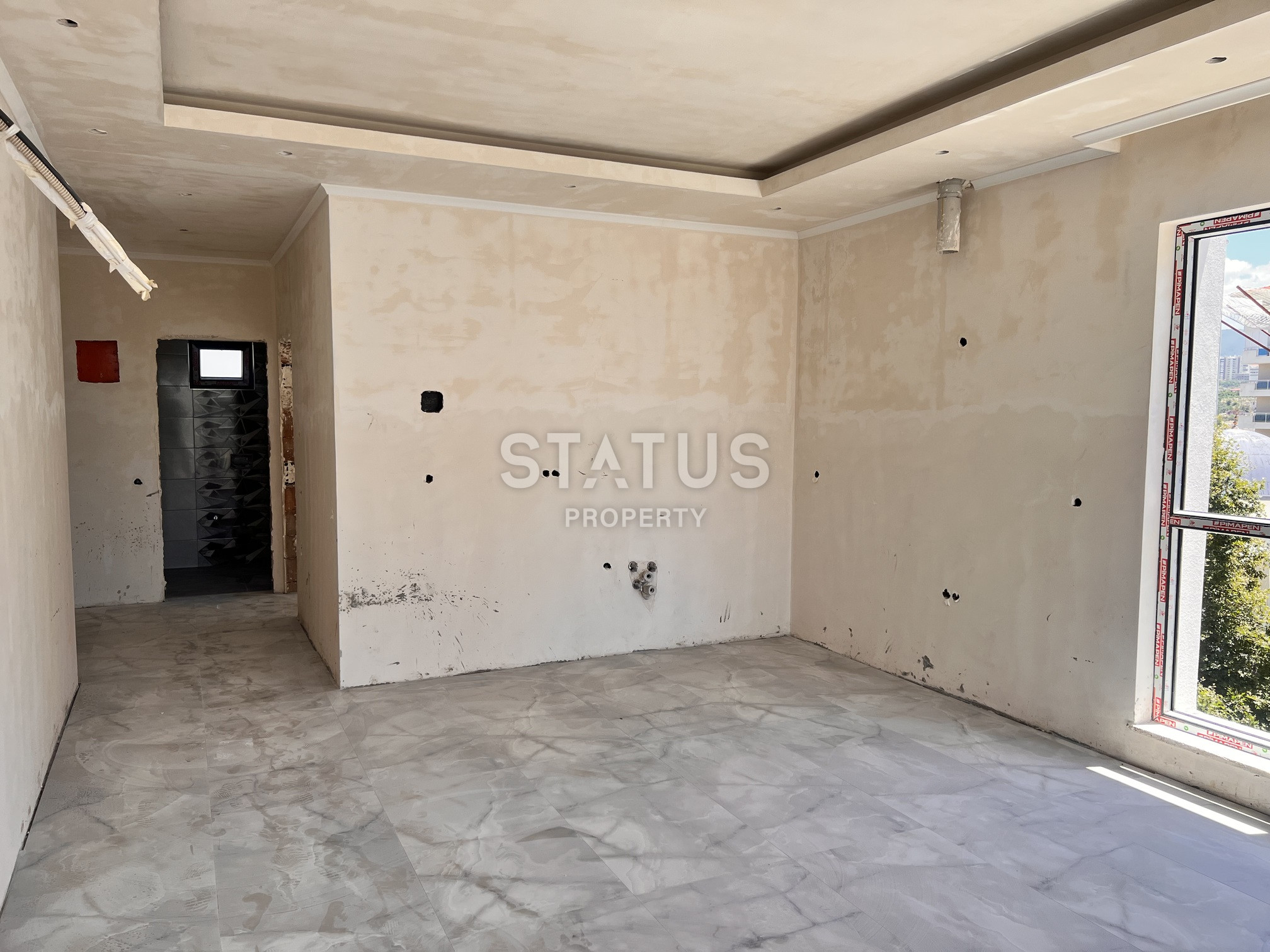 Двухкомнатная квартира на этапе пред сдаче в 400м от моря в Махмутларе. 60м2 фото 19