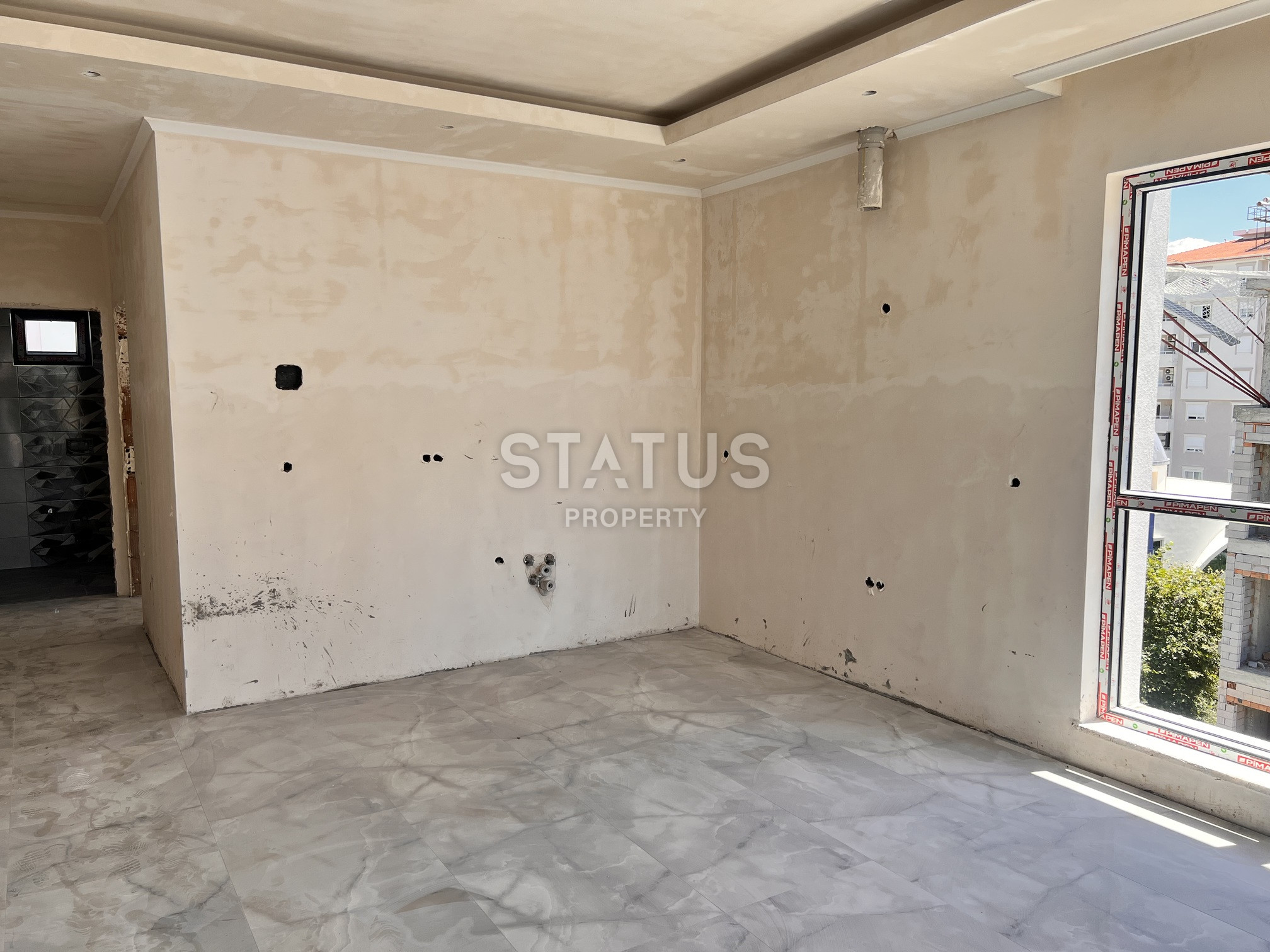 Двухкомнатная квартира на этапе пред сдаче в 400м от моря в Махмутларе. 60м2 фото 21