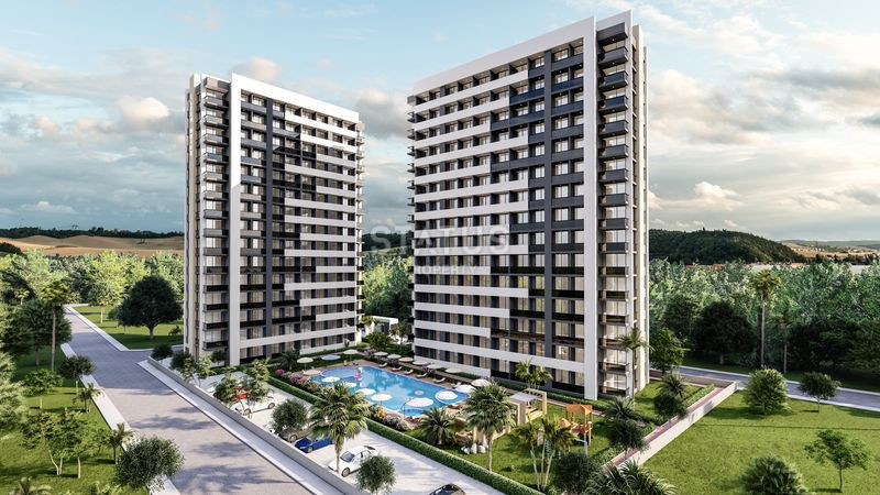 Новый инвестиционный проект в 400м от моря в Мерсине, Эрдемли. 65м2 – 73м2 фото 1
