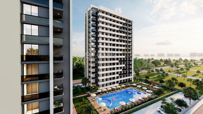 Новый инвестиционный проект в 400м от моря в Мерсине, Эрдемли. 65м2 – 73м2 фото 2