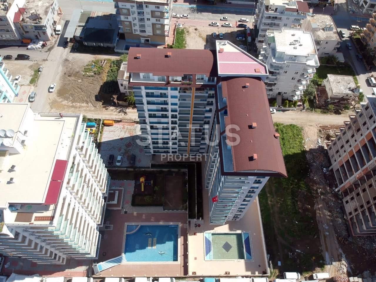 Новая квартира с мебелью 1+1 в комплексе с бассейном, Махмутлар,68 м2 фото 17