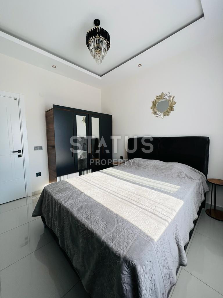 Меблированные апартаменты 1+1 в районе Каргыджак, 55 м2 фото 9