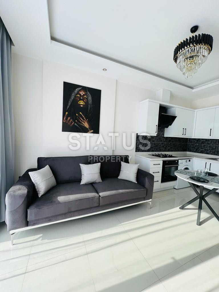 Меблированные апартаменты 1+1 в районе Каргыджак, 55 м2 фото 17