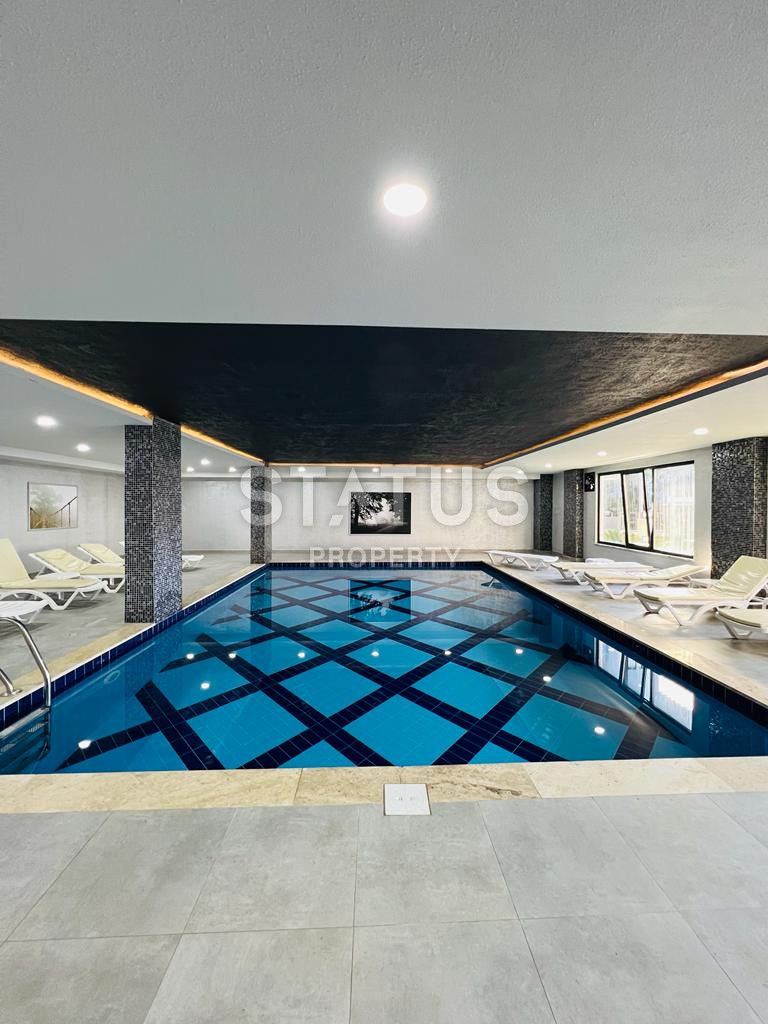 Меблированные апартаменты 1+1 в районе Каргыджак, 55 м2 фото 26