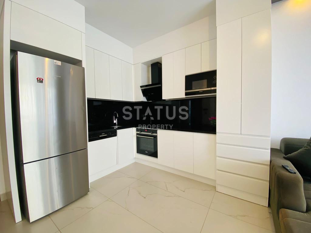 Three-room furnished apartment 200m from the sea in a boutique complex in Kargicak. 85m2 фото 3