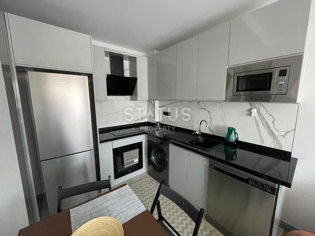 Двухкомнатная меблированная квартир а в 400м от пляжа Клеопарты в ЖК с полной инфраструктурой. 50м2 фото 3