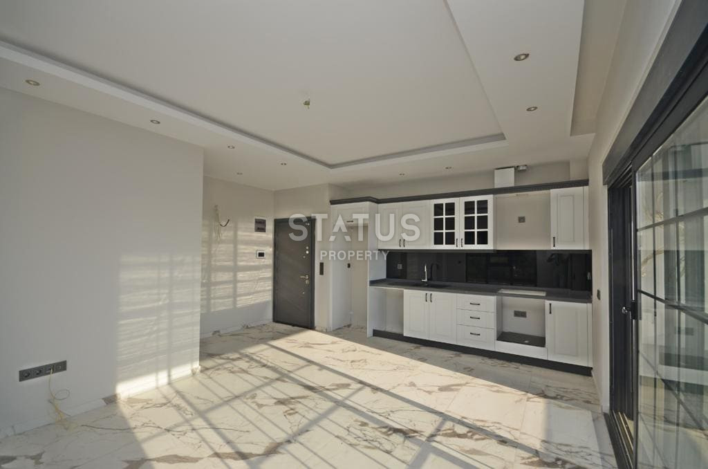 Новая, трёхкомнатная квартира в 100м от моря в Кестеле. 73м2 фото 3