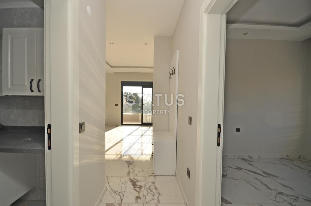 Новая, трёхкомнатная квартира в 100м от моря в Кестеле. 73м2 фото 15