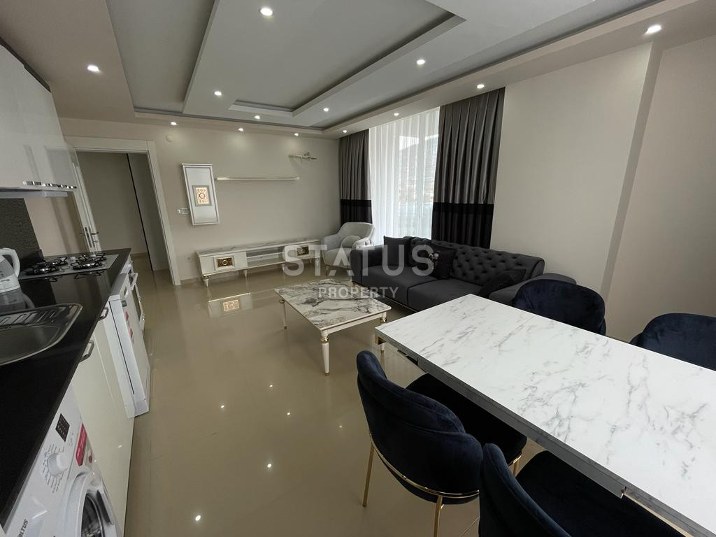 Beautiful one-bedroom furnished apartment in Mahmutlar, 100m2 фото 3