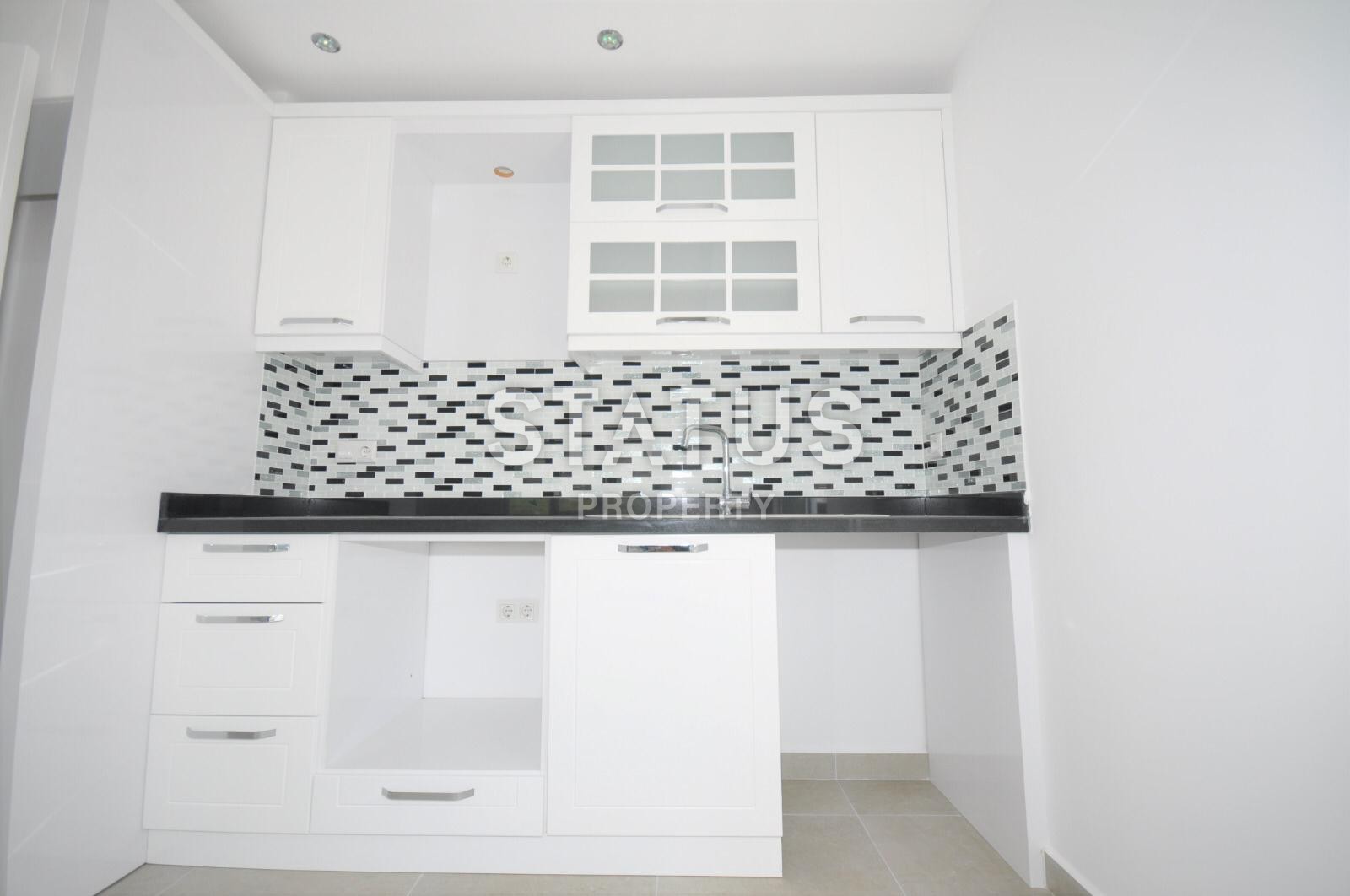 Двухкомнатная квартира в новом комплексе в Махмутларе, 65 м2 фото 8