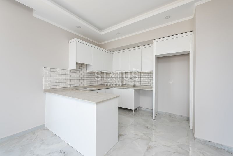 Двухкомнатная квартира в новом жилом комплексе в районе Авсаллар, 64 м2 фото 3