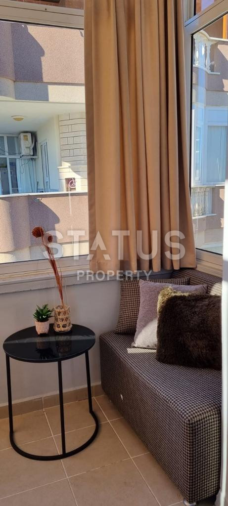 Spacious two-room apartment in an urban-type building in the center of Alanya. 60m2 фото 3