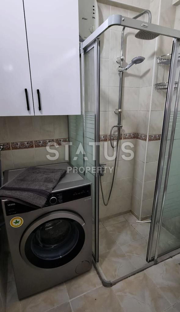 Spacious two-room apartment in an urban-type building in the center of Alanya. 60m2 фото 12
