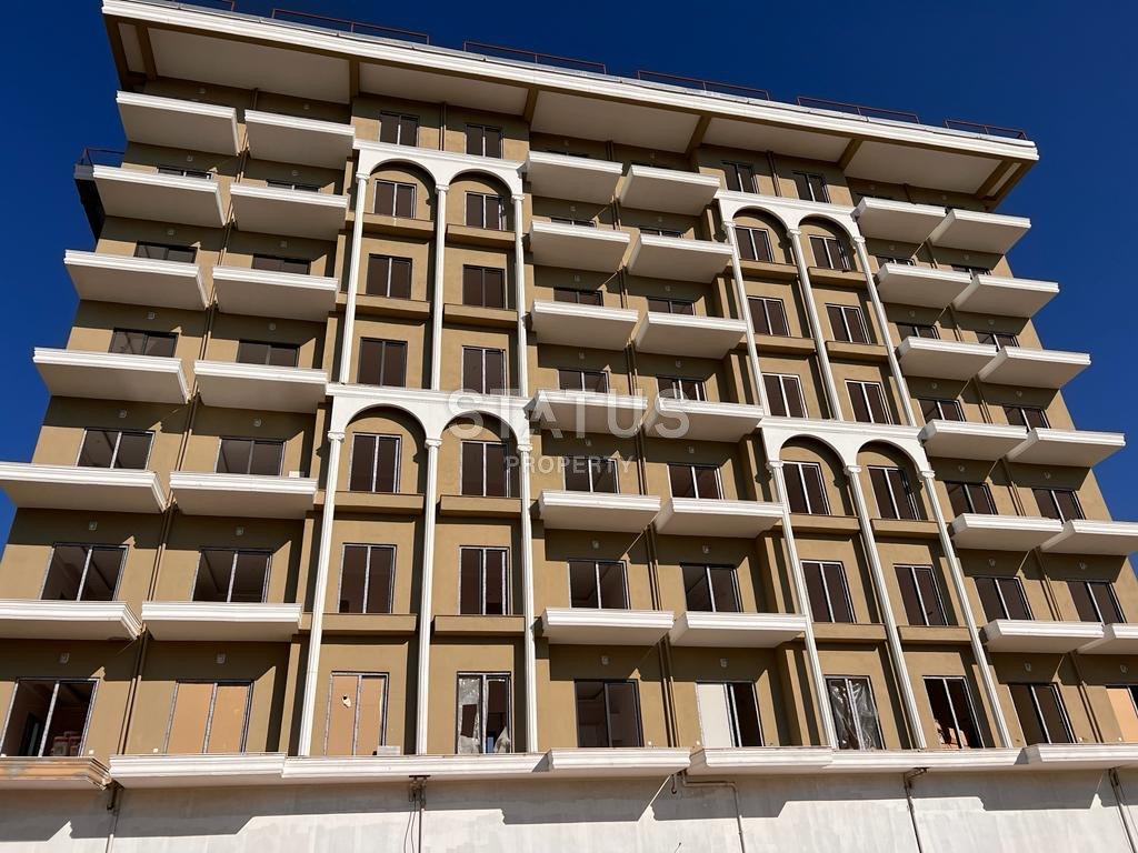 Новая двухкомнатная квартира 1+1 в новом ЖК в Авсалларе. 50м2 фото 2
