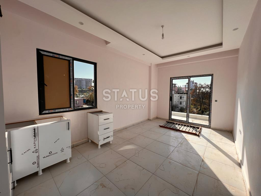 Новая двухкомнатная квартира 1+1 в новом ЖК в Авсалларе. 50м2 фото 14