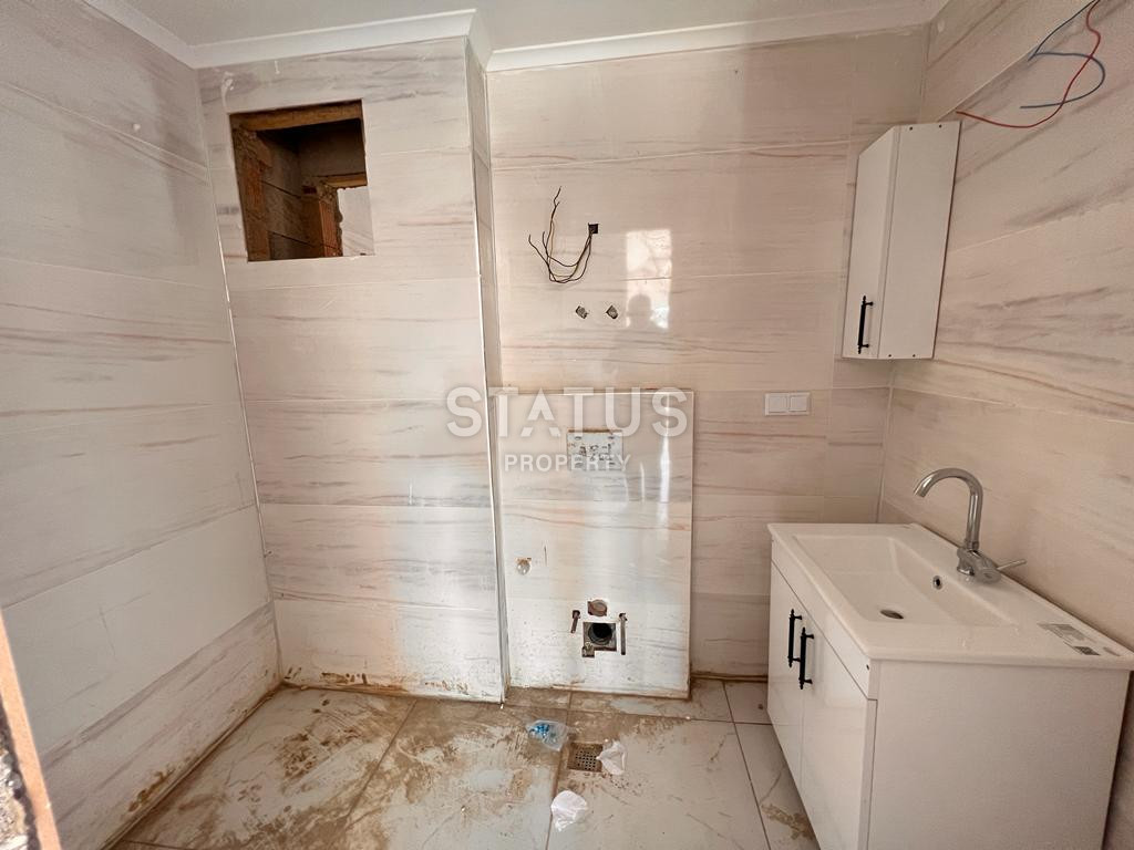 Новая двухкомнатная квартира 1+1 в новом ЖК в Авсалларе. 50м2 фото 15