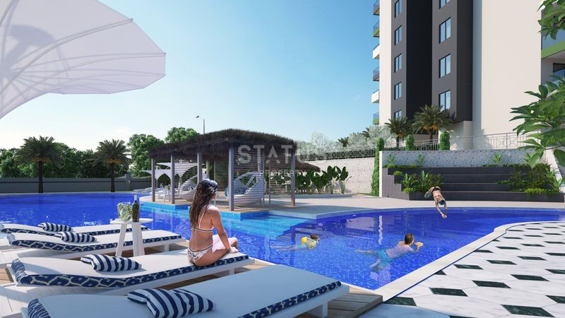 Эксклюзивный проект в районе Демирташ с инфинити-бассейном, 53-130 м2 фото 4