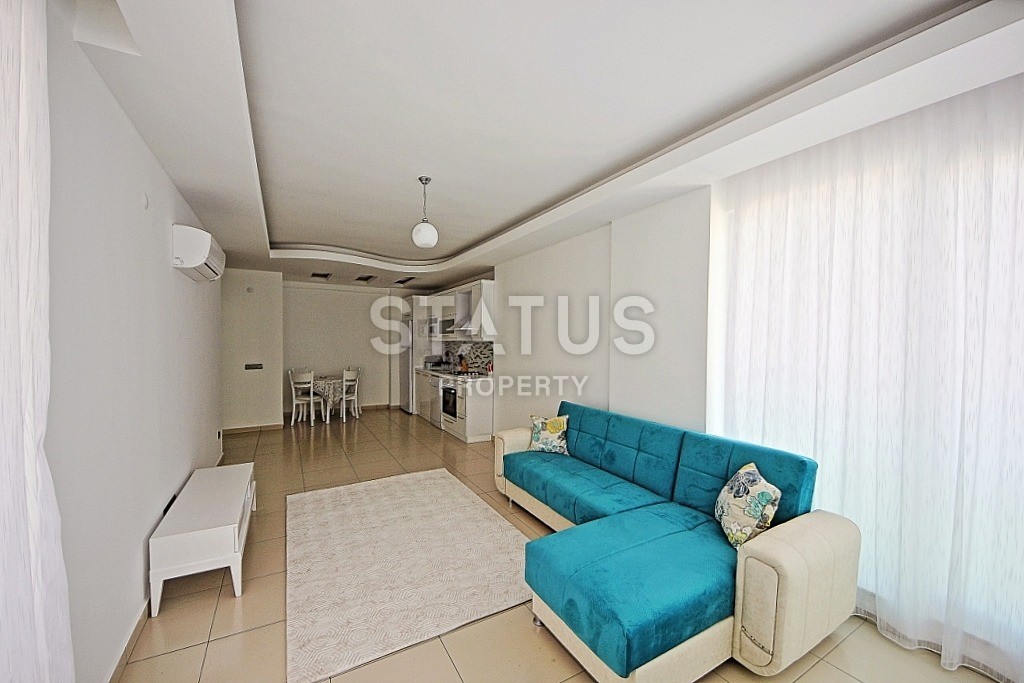 Современные апартаменты в новом доме с инфраструктурой в районе Тосмур 65 кв.м. фото 4