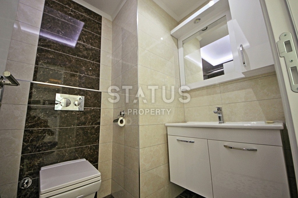 Современные апартаменты в новом доме с инфраструктурой в районе Тосмур 65 кв.м. фото 8