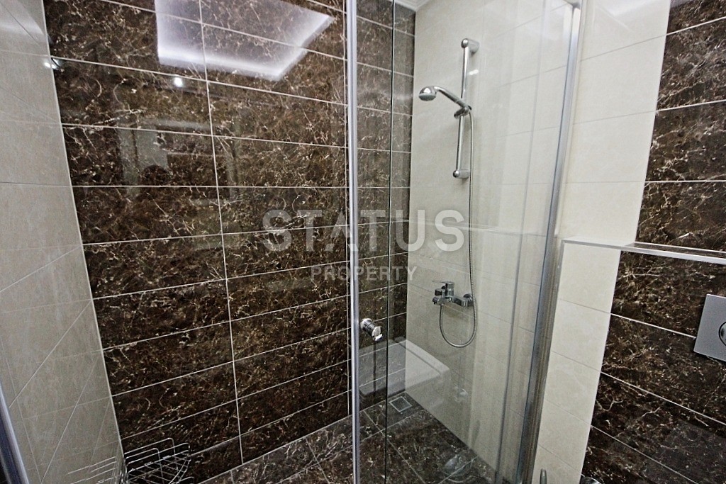 Современные апартаменты в новом доме с инфраструктурой в районе Тосмур 65 кв.м. фото 12