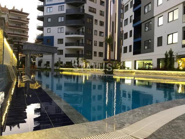 Трёхкомнатная квартира в комплексе с богатой инфраструктурой в районе пляжа Клеопатра, 85 м2 фото 3