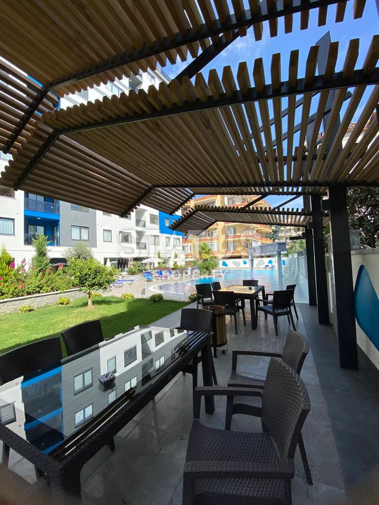 Трёхкомнатная квартира в комплексе с богатой инфраструктурой в районе пляжа Клеопатра, 85 м2 фото 34