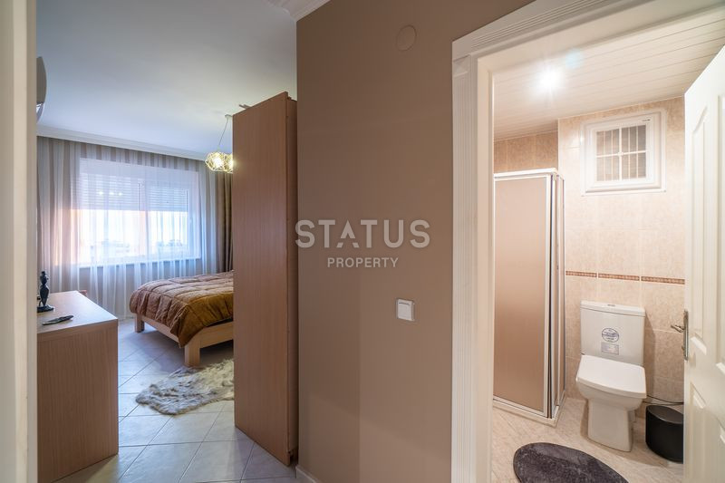 Уютная трёхкомнатная меблированная квартира 250м от моря в открытом районе Тосмур. 120м2 фото 13