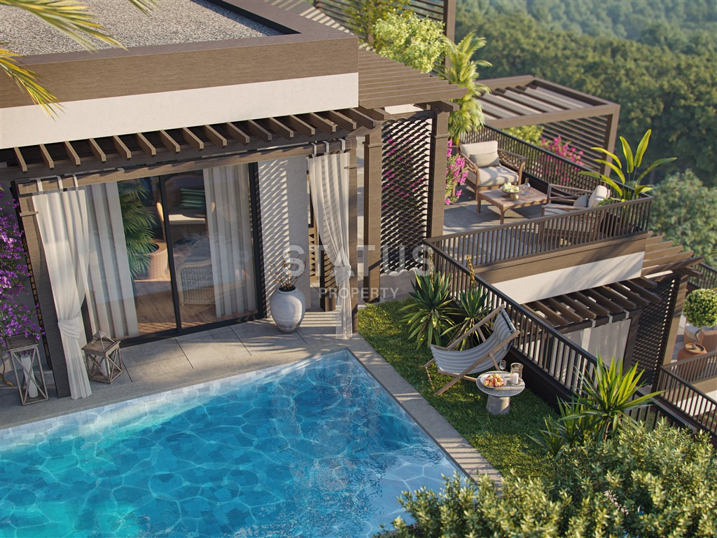 A luxurious multifunctional complex of apartments and townhouses in the Kargicak area. 50m2 -169m2 фото 20