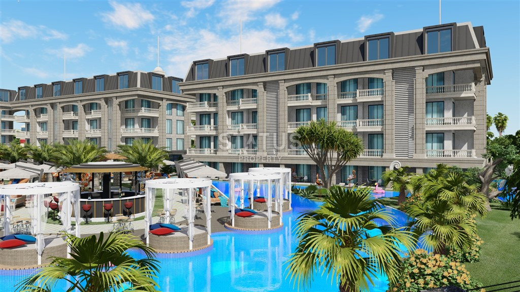 Роскошный жилой комплекс 550м от моря в Тюрклере. 53,5м2 – 122м2 фото 2