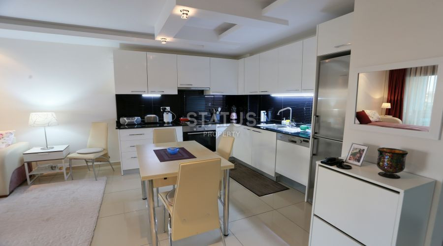 Двухкомнатная квартира в комплексе отельного типа в Джикджилли. 70м2 фото 12