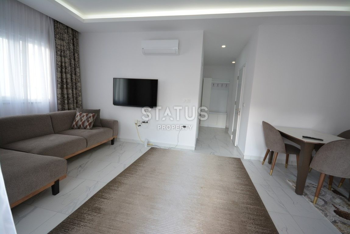 Просторная квартира в комплексе с удачным расположением в Махмутларе. 65м2 фото 3