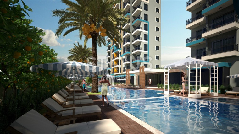 Квартира 1+1 в районе Махмутлар 55м2 фото 1