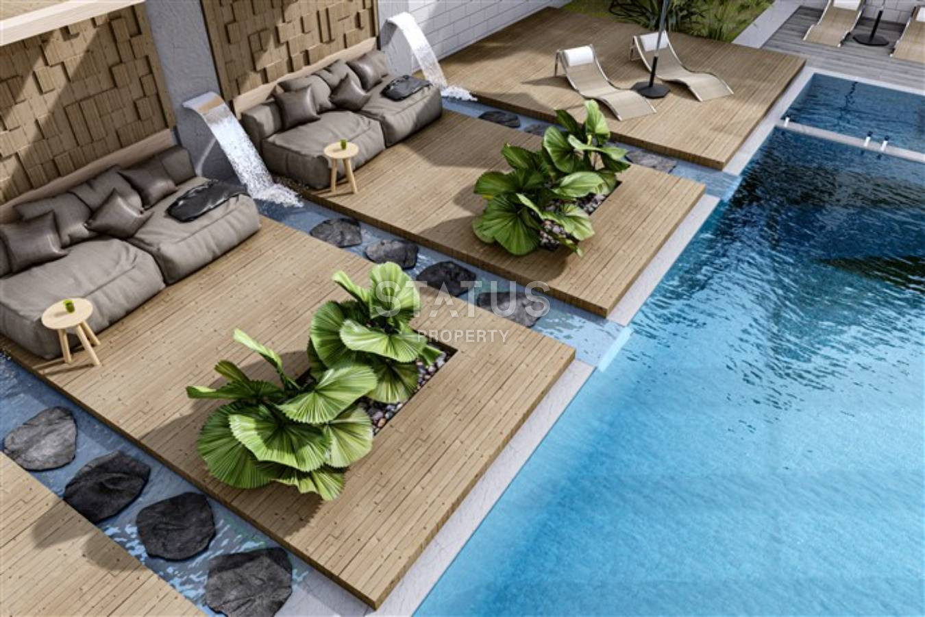 Двухкомнатная квартира в новом доме в Махмутларе. 60м2 фото 14