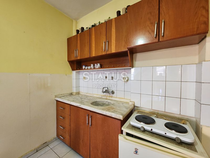 Двухкомнатная квартира в доме городского типа в Махмутларе. 65м2 фото 12