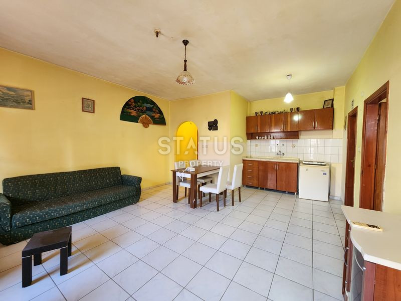 Двухкомнатная квартира в доме городского типа в Махмутларе. 65м2 фото 18