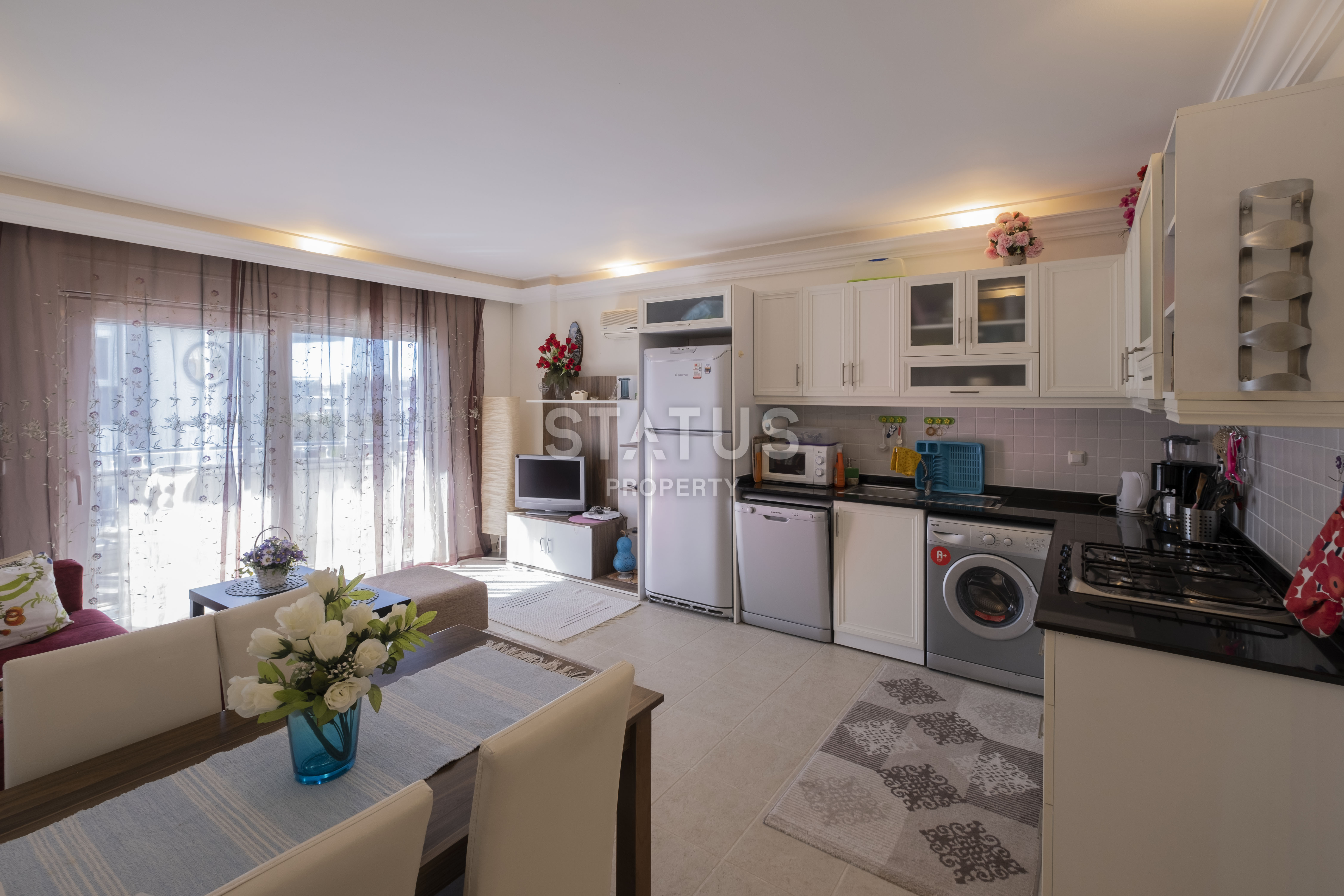 Меблированная двухкомнатная квартира в районе Джикджли, 60м2. фото 2