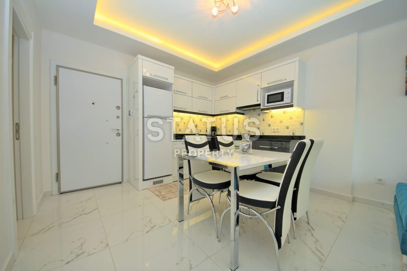 Меблированная двухкомнатная квартира в комплексе с инфраструктурой, в Махмутларе,70 м2 фото 5