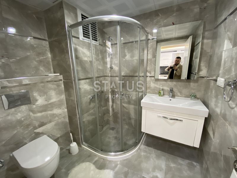 Двухкомнатные апартаменты в районе Махмутлар, 55м2 фото 5