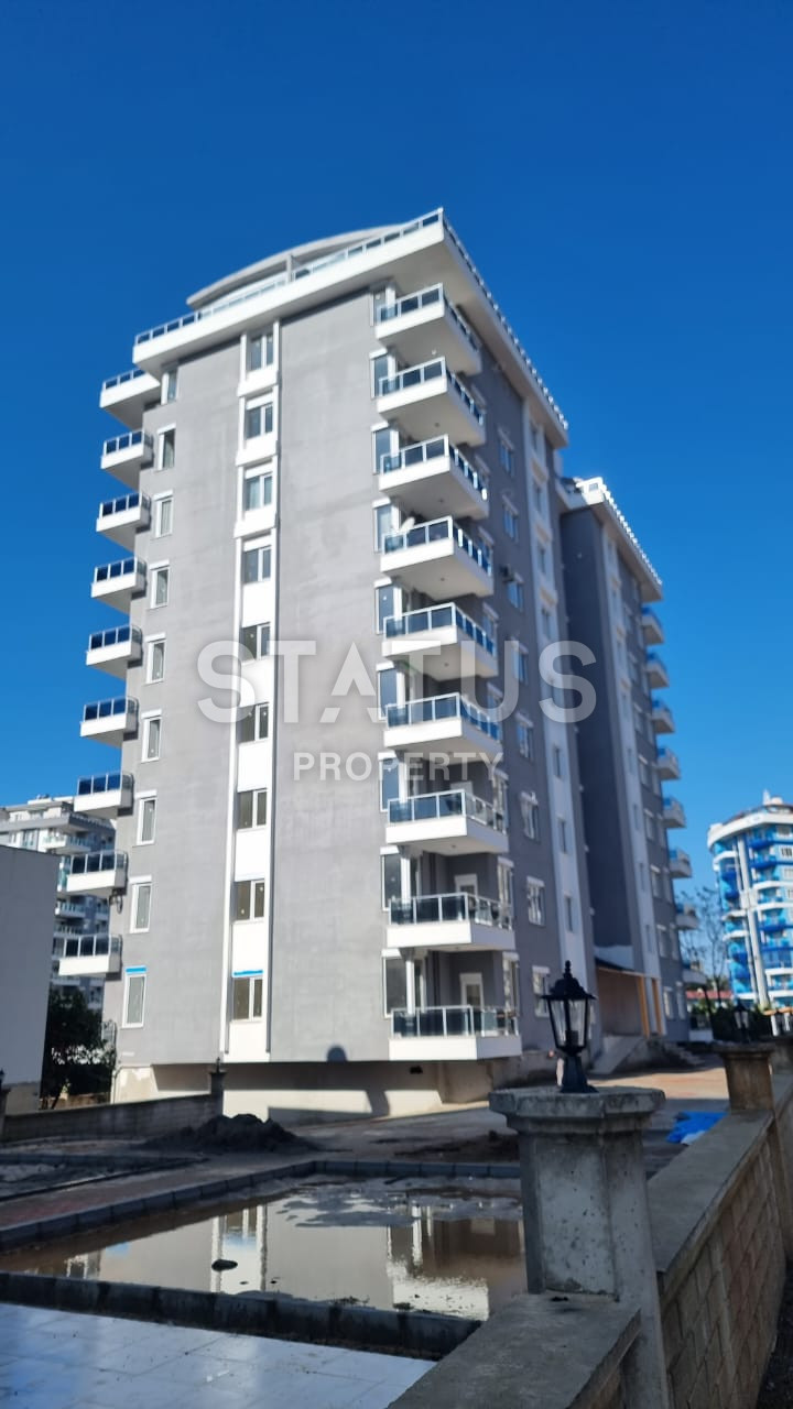 Новая двухкомнатная квартира в 600м от моря в Махмутларе. 60м2 фото 3