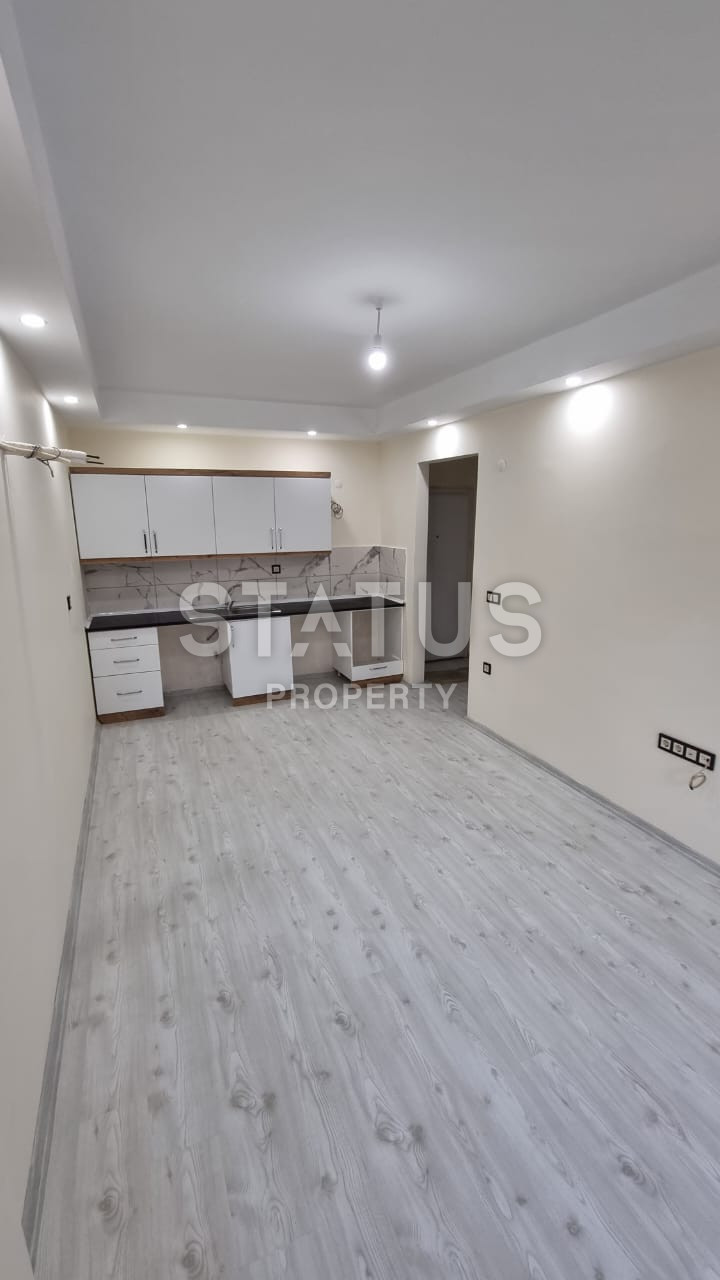 Новая двухкомнатная квартира в 600м от моря в Махмутларе. 60м2 фото 4