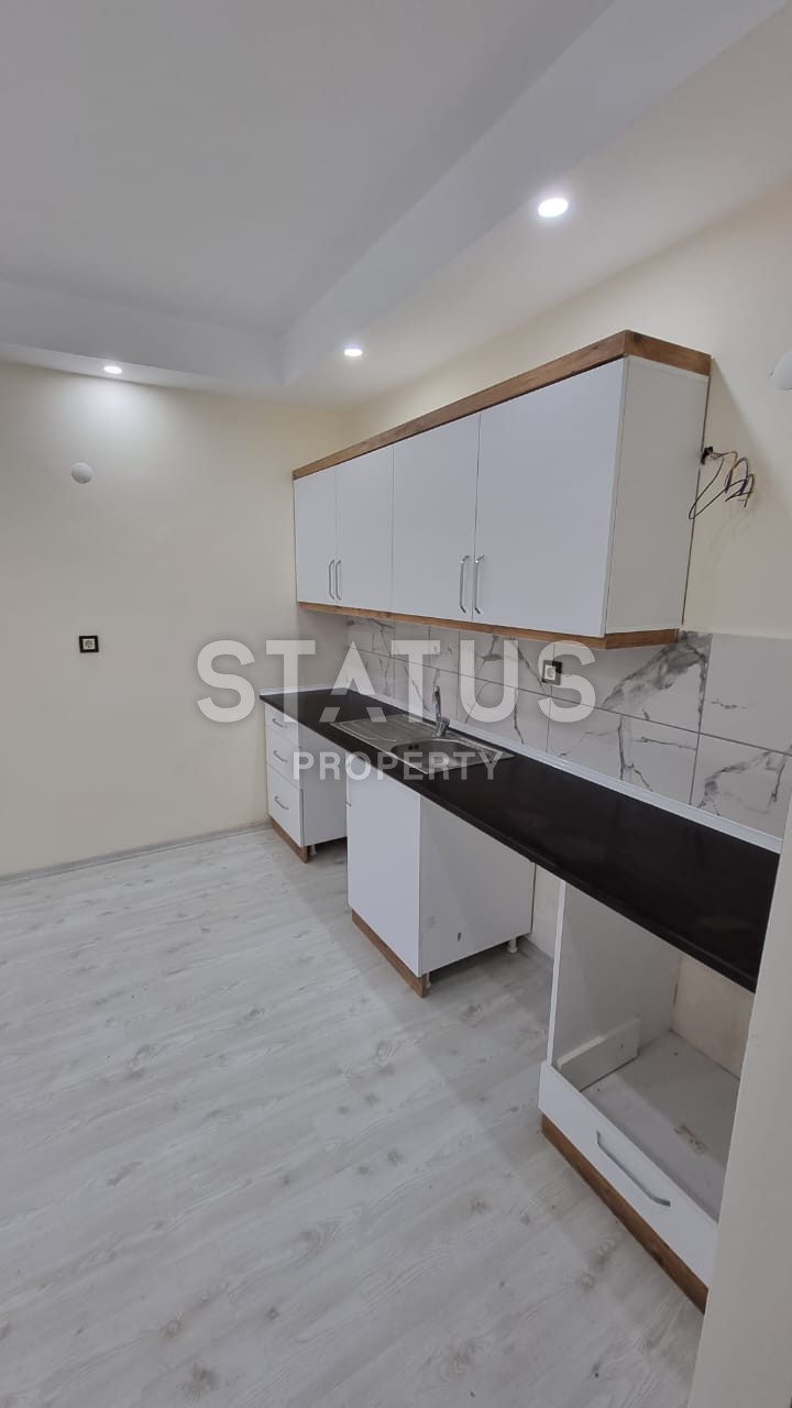 Новая двухкомнатная квартира в 600м от моря в Махмутларе. 60м2 фото 5